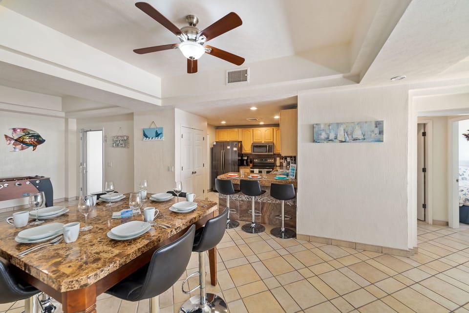 Dining space and kitchen area connect seamlessly with the living room.