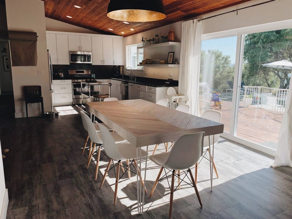 Dining area with sliding glass door out to deck...and overlooking the pool