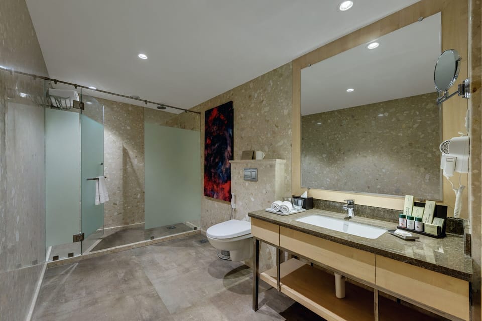 Shower, rainfall showerhead, towels