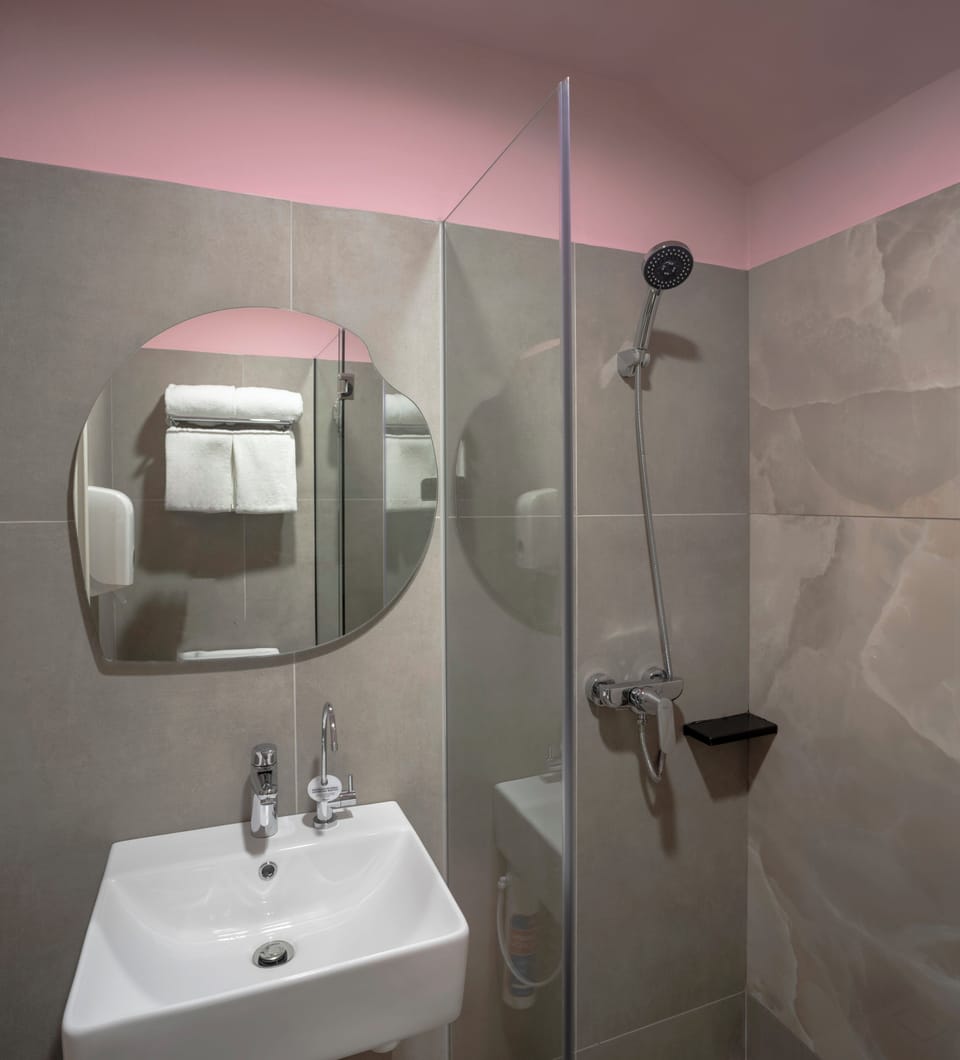 Shower, free toiletries, hair dryer, towels