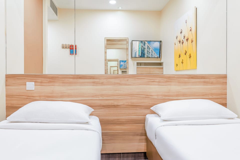 Standard Twin Room, 2 Twin Beds | WiFi (free), bed sheets