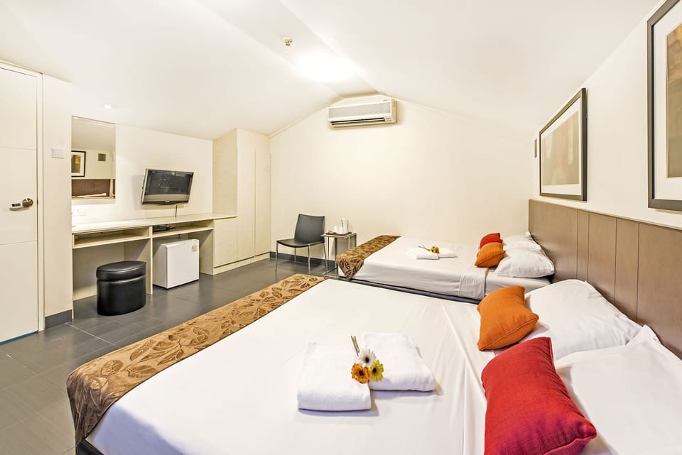 Family Room, 2 Queen Beds | Desk, WiFi (free), bed sheets