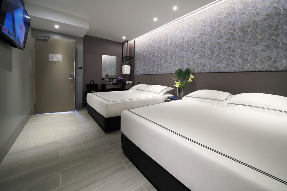 Family Room | Minibar, in-room safe, iron/ironing board (on request), WiFi (free)