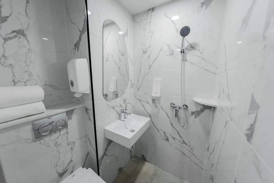 Shower, free toiletries, hair dryer, towels