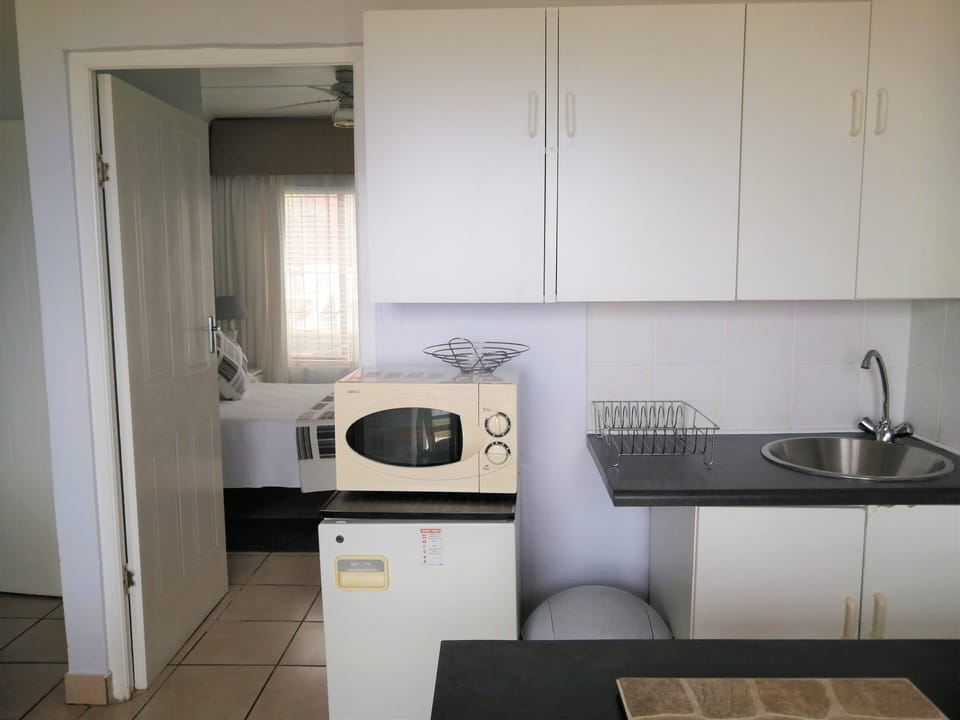 Oestervanger Self catering | Private kitchenette | Mini-fridge, microwave, coffee/tea maker, toaster