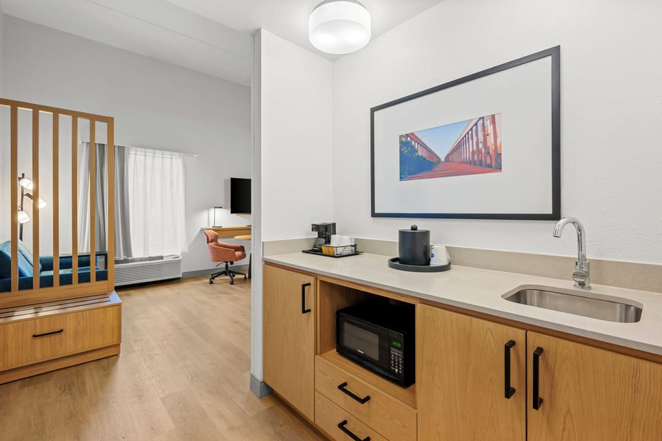 Studio Suite, One King and One Sofa Bed, Non-Smoking | In-room safe, desk, blackout drapes, iron/ironing board