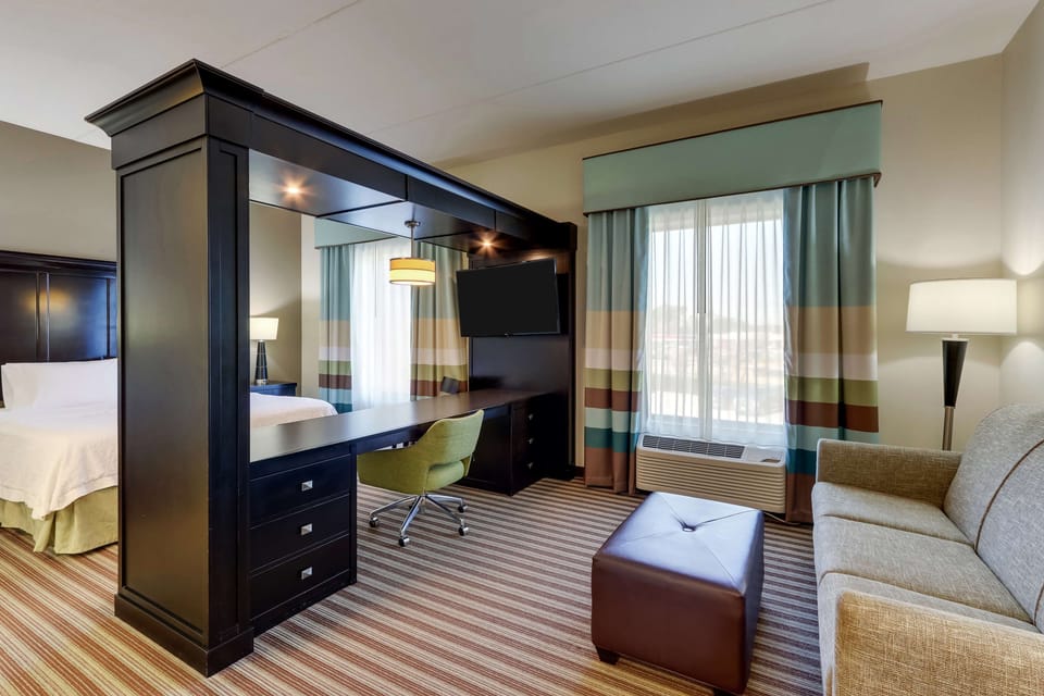 Studio Suite, One King and One Sofa Bed, Non-Smoking | In-room safe, desk, blackout drapes, iron/ironing board