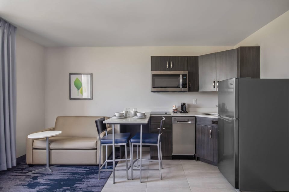 Pillowtop beds, desk, laptop workspace, blackout drapes