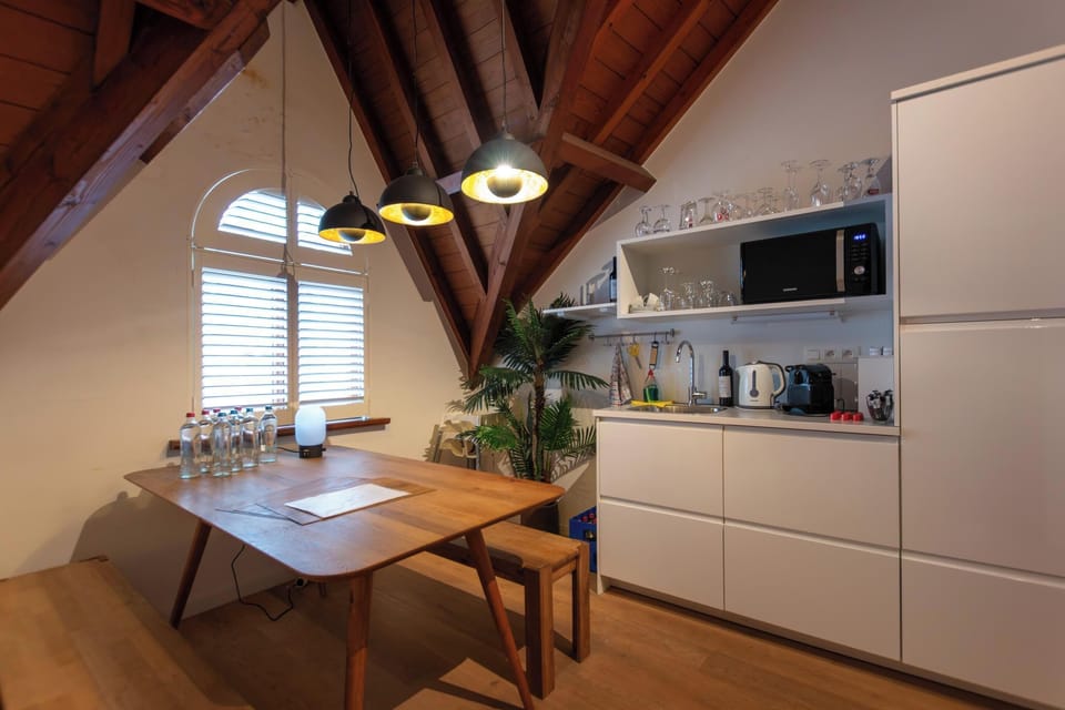 Deluxe Spanish Penthouse Suite | Private kitchenette | Fridge, microwave, coffee/tea maker, electric kettle