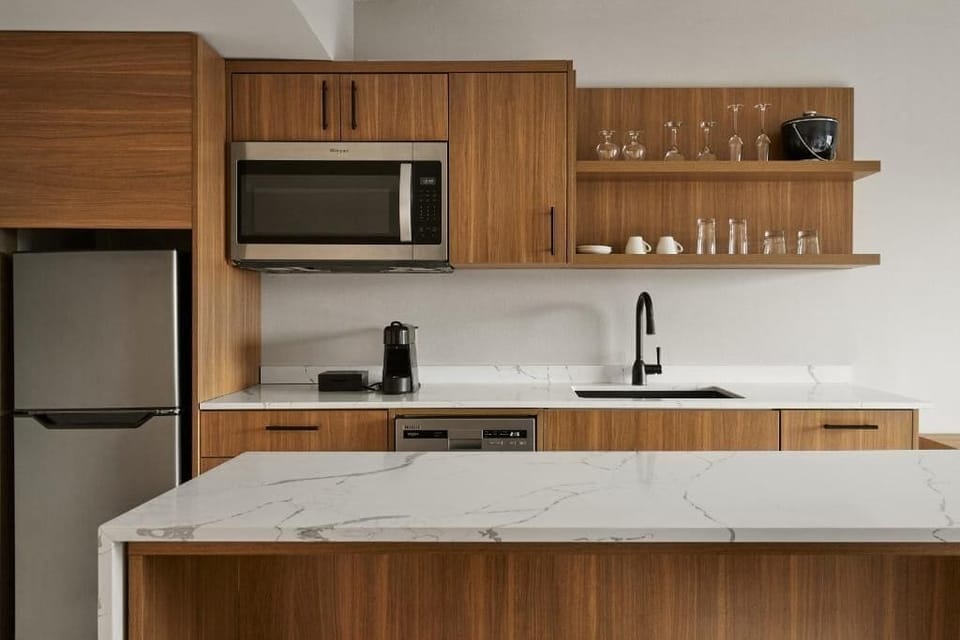 Suite, 1 King Bed with Sofa bed | Private kitchenette | Mini-fridge, espresso maker