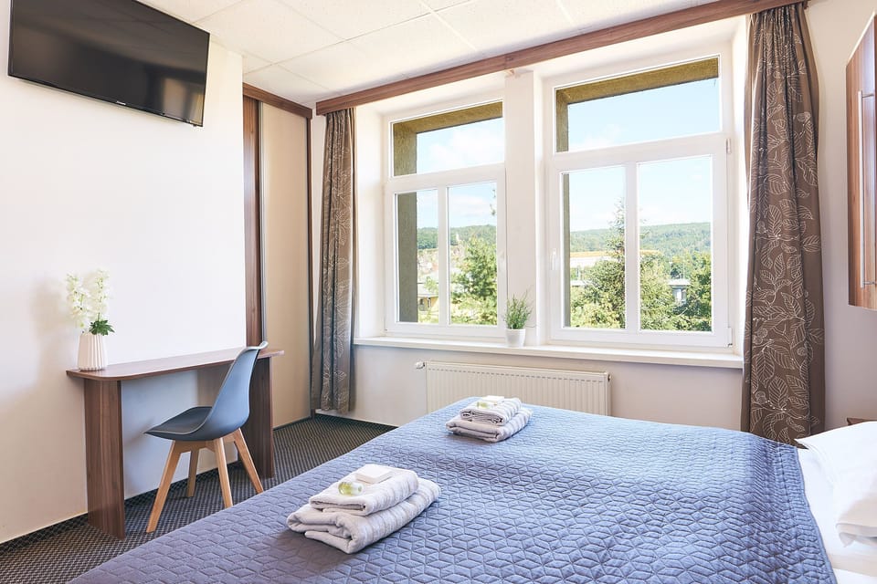 Triple Room, Air conditioning | In-room safe, blackout drapes, free WiFi, bed sheets