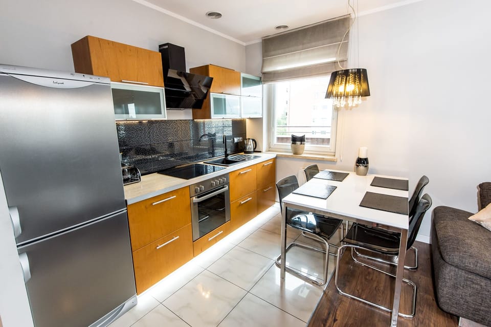 Comfort Apartment | Private kitchen | Full-size fridge, oven, stovetop, electric kettle