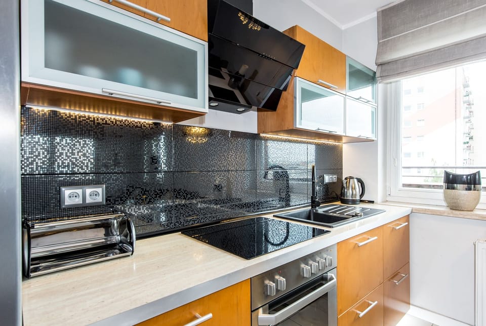 Comfort Apartment | Private kitchen | Full-size fridge, oven, stovetop, electric kettle