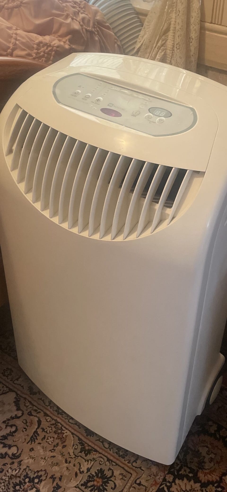 Seasonal A/C in the downstairs master bedroom. 