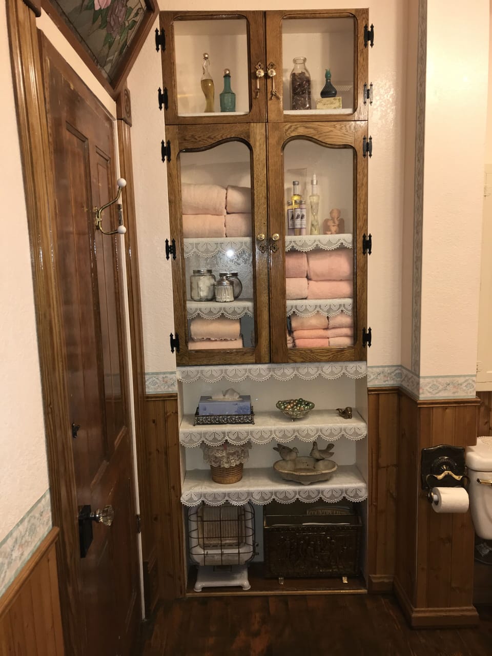 Freshly laundered towels, cotton balls, q-tips and a makeup towel are provided. 