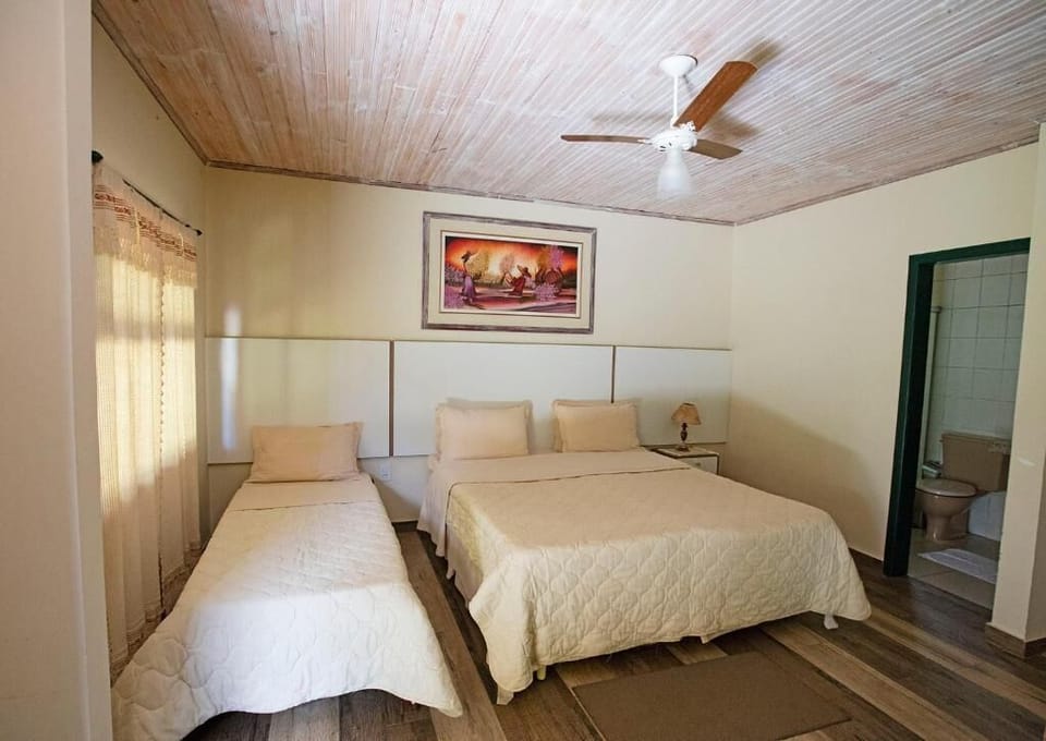 Standard Triple Room | Minibar, desk, blackout drapes, iron/ironing board