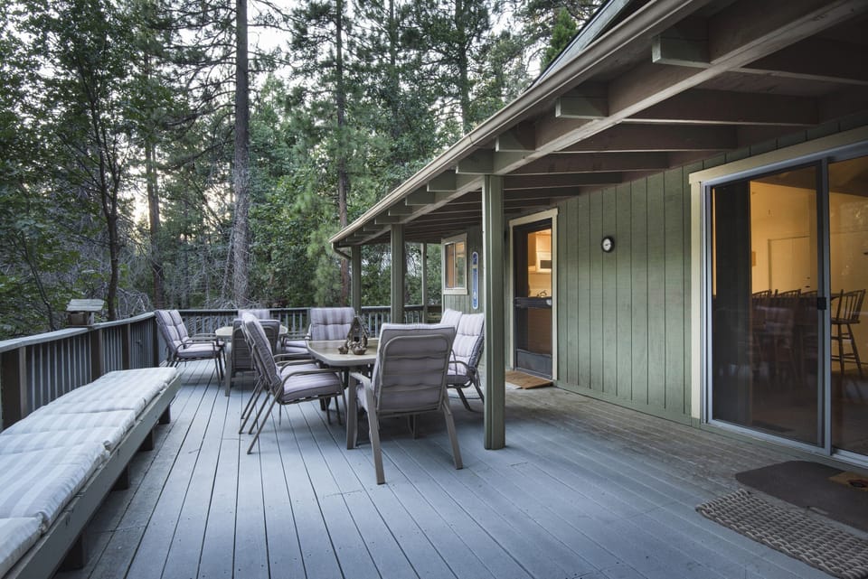 The large deck, with two patio tables that set 12.