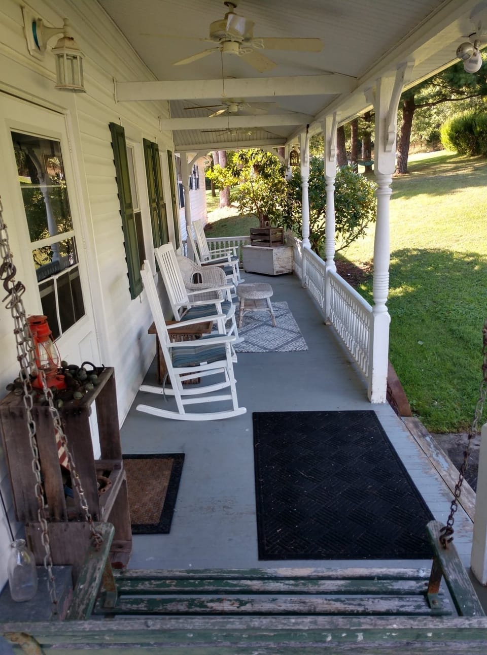 Front porch with ceiling fans make a perfect space to relax and enjoy!