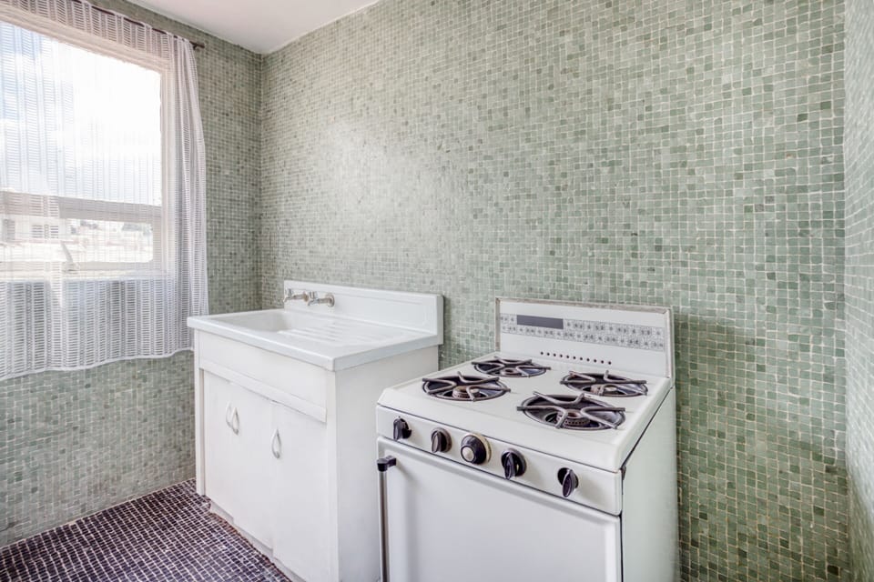 Standard Quadruple Room | Private kitchenette