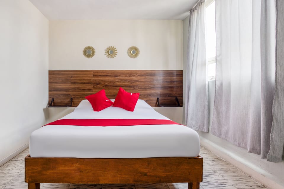 Standard Quadruple Room | Iron/ironing board (on request), bed sheets