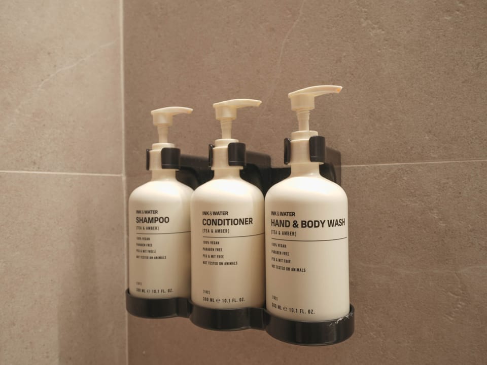Shower, rainfall showerhead, free toiletries, hair dryer