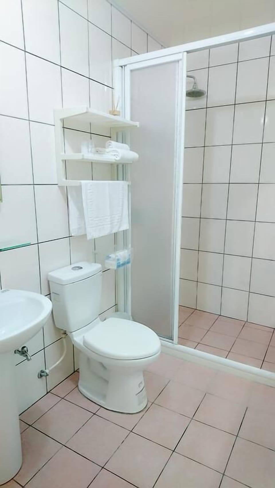 Shower, free toiletries, hair dryer, slippers