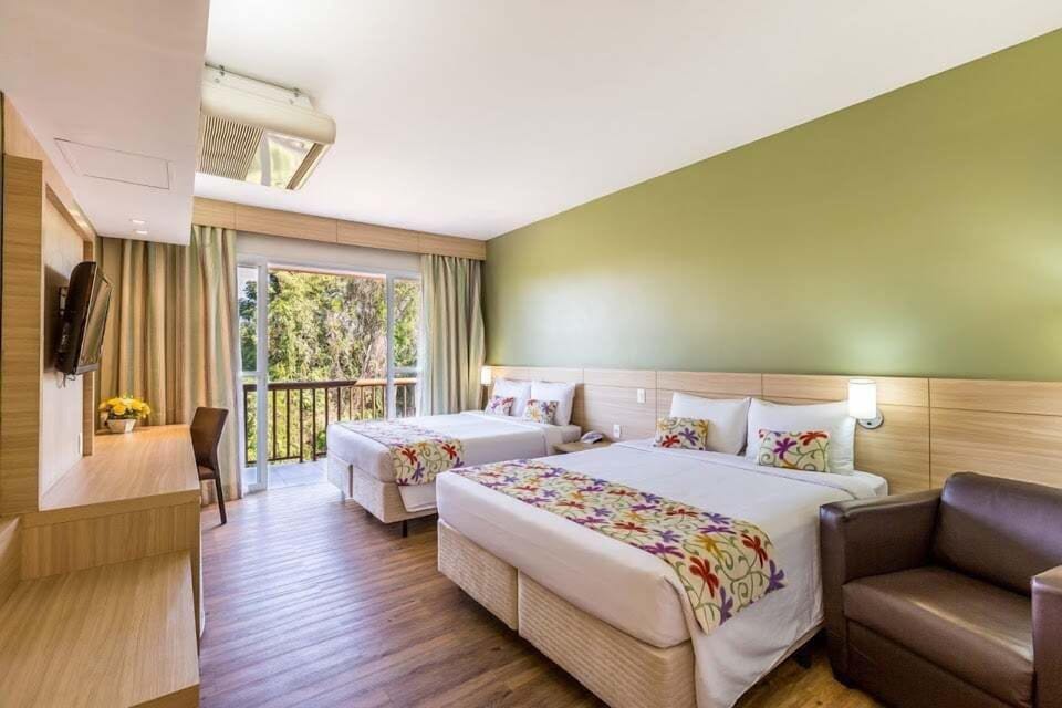 Quarto Superior com varanda | Minibar, in-room safe, blackout drapes, free WiFi