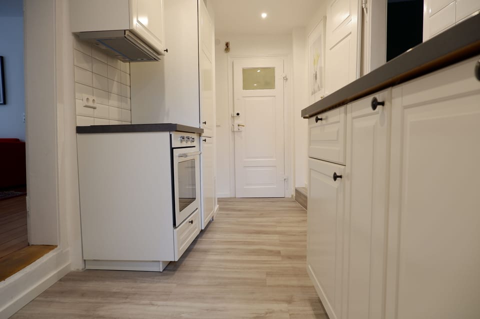 Apartment | Private kitchen | Full-size fridge, oven, stovetop, dishwasher