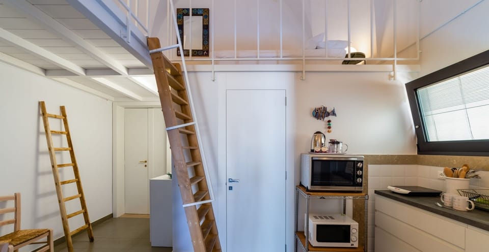 Apartment, 1 Bedroom | Private kitchenette | Full-size fridge, microwave, oven, stovetop