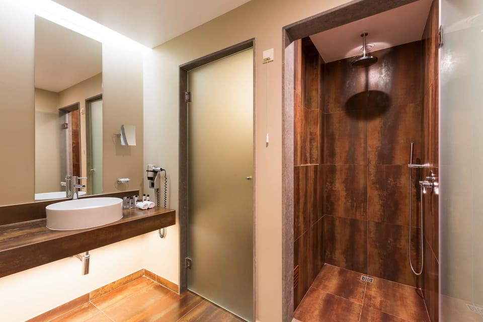 Shower, rainfall showerhead, eco-friendly toiletries, hair dryer