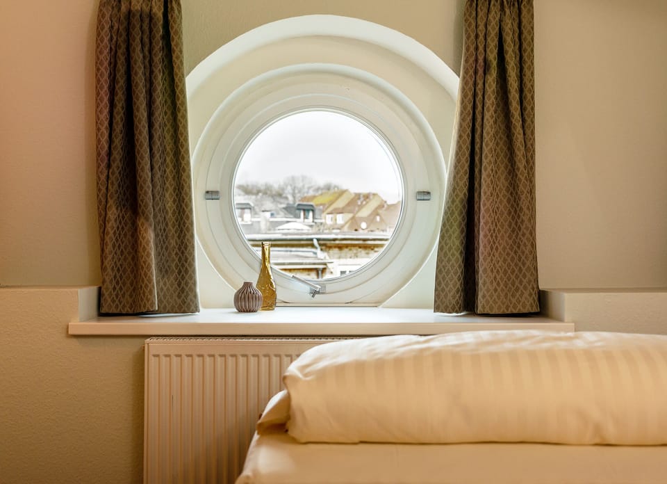 Standard Single Room | Hypo-allergenic bedding, desk, blackout drapes, iron/ironing board