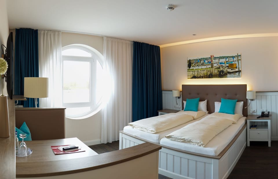 Hypo-allergenic bedding, desk, blackout drapes, iron/ironing board