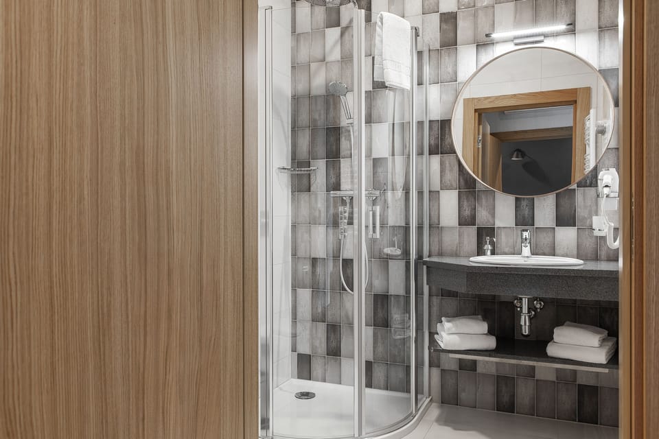 Shower, free toiletries, hair dryer, bathrobes