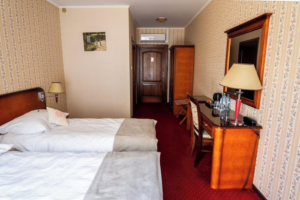 Desk, blackout drapes, iron/ironing board (on request), WiFi (free)
