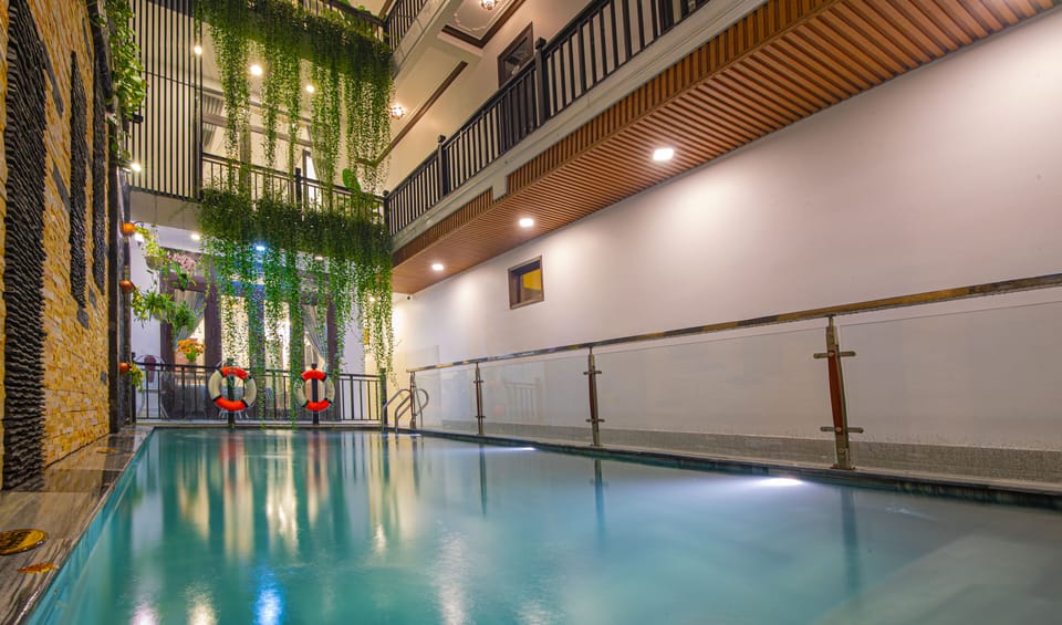 Indoor pool, outdoor pool, open 5:00 AM to 9:00 PM, pool umbrellas