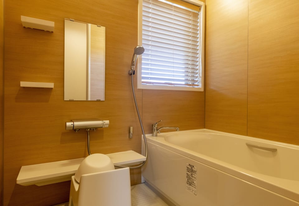 Bathtub, free toiletries, hair dryer, electronic bidet