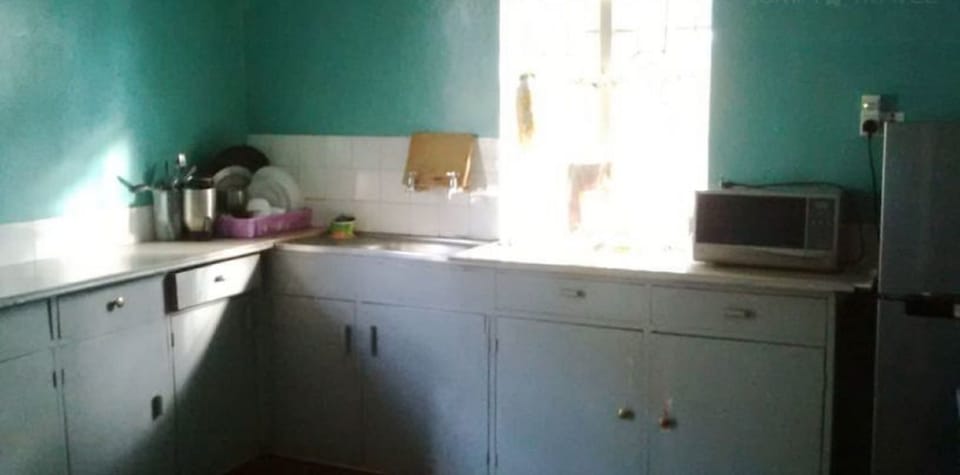 Apartment, 3 Bedrooms | Private kitchen | Fridge, microwave, oven, stovetop