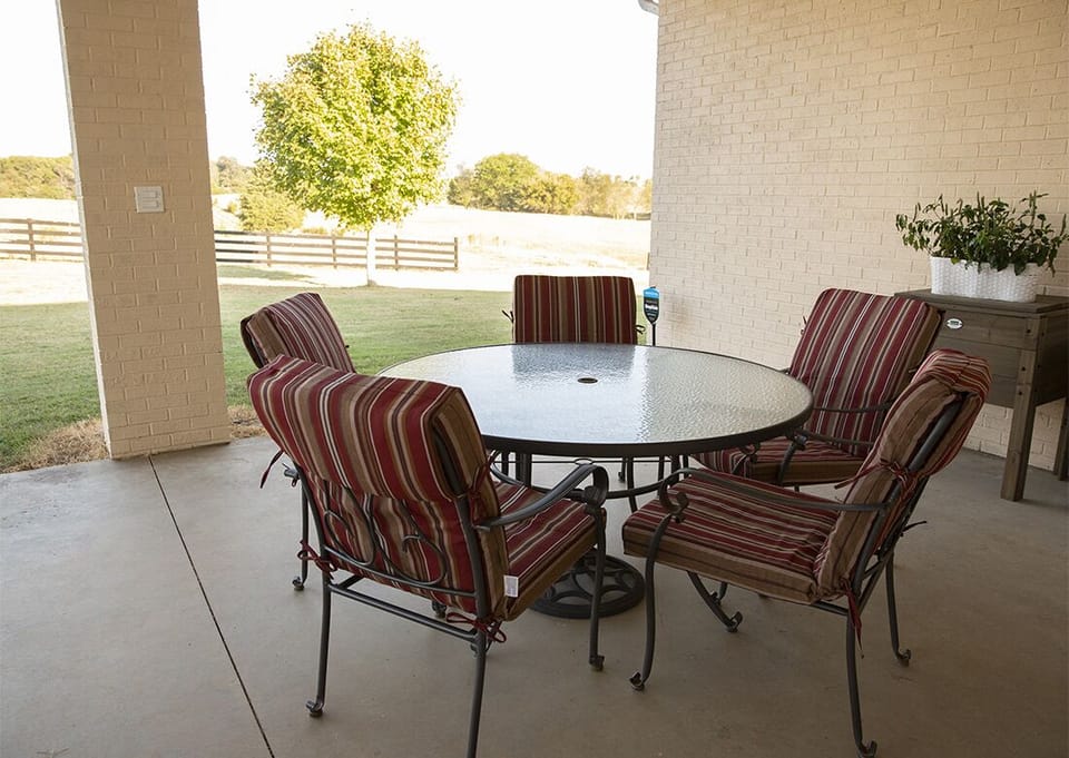 Outdoor seating under covered back patio