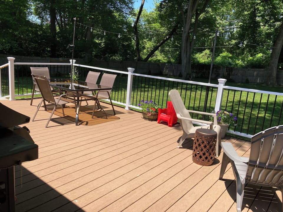 Deck in the back with railing.
