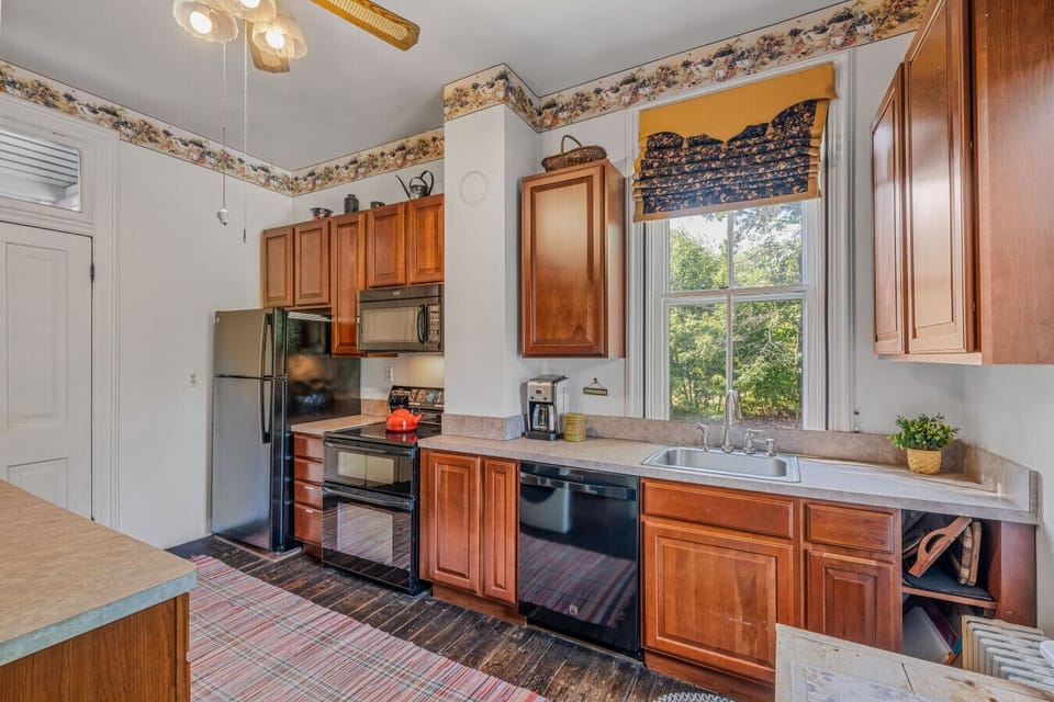A fully stocked kitchen with pots and pans!