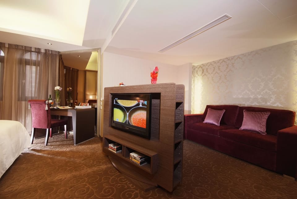 Standard Double Room (No windows) | Living area | 32-inch LCD TV with digital channels, TV