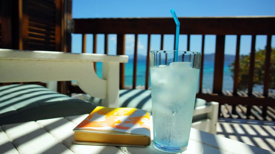Enjoy the peace and quiet of the end unit with a book and cool drink