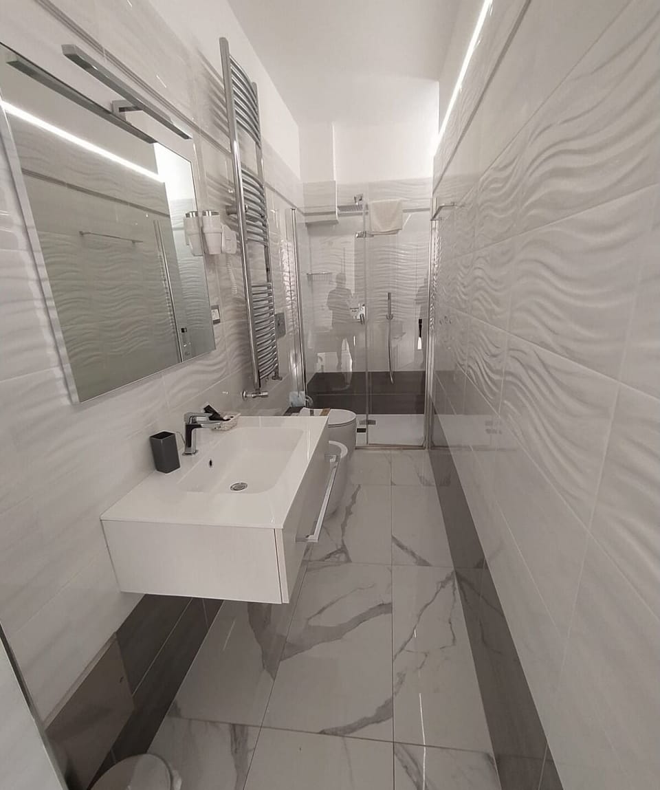 Luxury Quadruple Room | Bathroom | Slippers