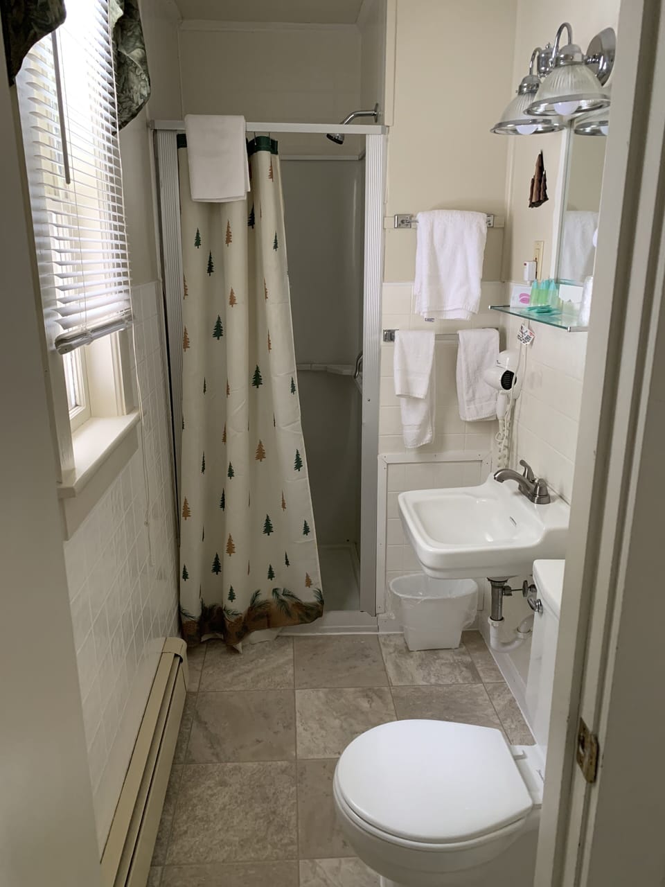 Standard Room (Motel 2-Room Suite #20) | Bathroom | Shower, hair dryer, towels, soap