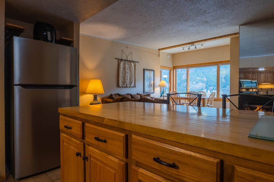 Kitchen opens up nicely to living area.