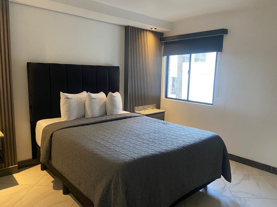 Standard Double Room, 2 Queen Beds, Private Bathroom | Iron/ironing board, free WiFi, bed sheets