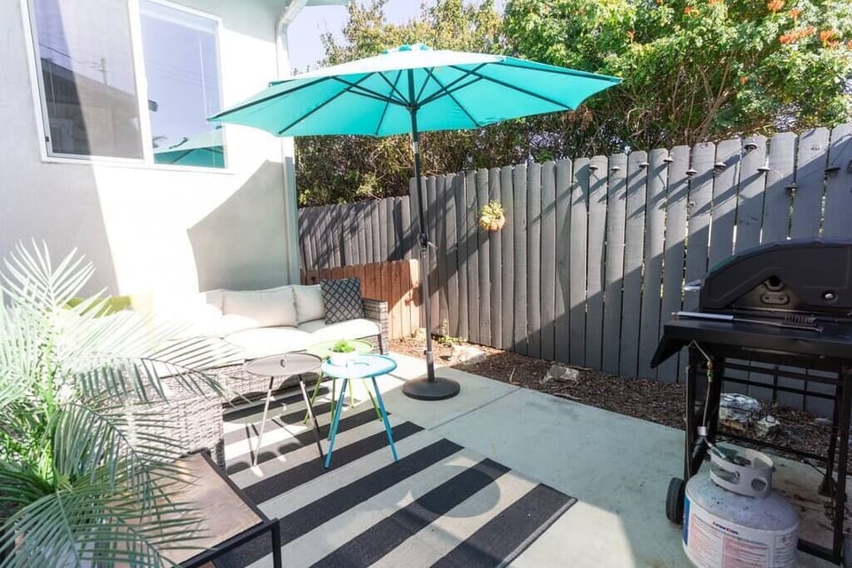 Backyard with outdoor seating and BBQ