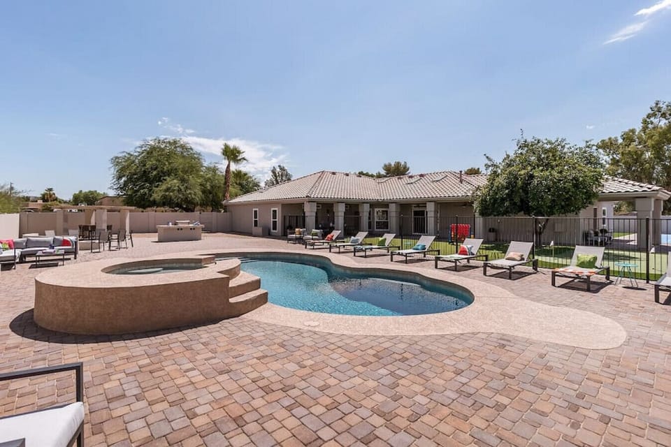 [Heated Pool] Resort Style heated pool, hot tub, and plenty of loungers and seating