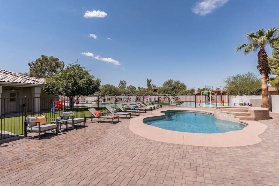 [Heated Pool] with plenty of loungers and seating, a pergola was also added for shade (not pictured)