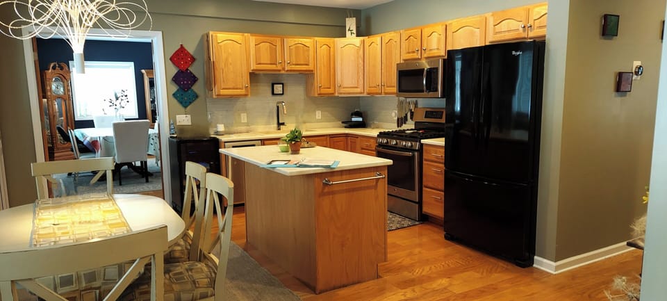 large, well equipped kitchen with coffee bar, dishwasher, beverage fridge
